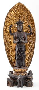 Japanese Gilt Wood Amida Buddha Sculpture: Japanese Red Lacquered and Gilt Wood Amida Buddha Sculpture, circa 19th century or earlier, the figure donning a crown with metal elements, a crystal third eye, and standing upon a lotus pedestal and