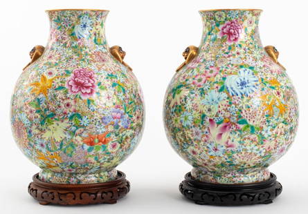 Chinese Qianlong Mark Millefleur Bailuzun Vases, 2: Pair of Chinese Millefleur Porcelain Bailuzun Vases, each with two gilded foo lion handles with articulated eyes and blue overglaze six character Qianlong mark in kaishu script to underside, with carv
