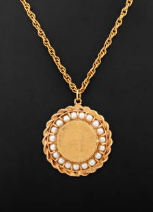 14K Yellow Gold & Cultured Pearl Locket Necklace: 14K Yellow Gold Pendant Necklace, brightly polished and Florentine finished, featuring a detachable locket pendant surrounded by a rope chain border, decorated with19 round cultured pearls, approx. 3.