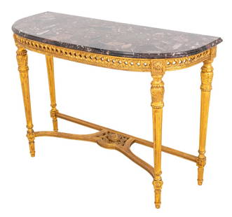 Louis XVI Style Giltwood and Marble Console Table: Louis XVI Style Rouge Griotte Marble Topped D-Shaped Giltwood Console Table, the apron carved in entrelac decoration above paterae-headed, fluted, tapering columnar legs conjoined by a stretcher cente