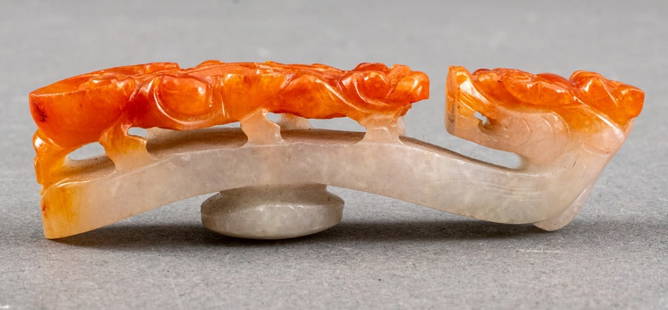 Chinese Russet & White Jade Belt Hook: Antique Chinese Jade Clothes Hook, the base in white jade, the top expertly carved in orange russet jade skin into a mythical dragon creature surmounted by a smaller serpentine dragon. 2.75" H x 0.75"