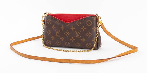 Sold at Auction: A handbag marked Louis Vuitton with chain/belted