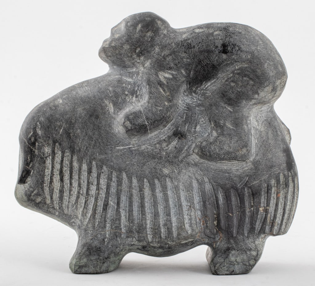 Inuit Soapstone Sculpture of a Man and Musk Ox (1 of 8)