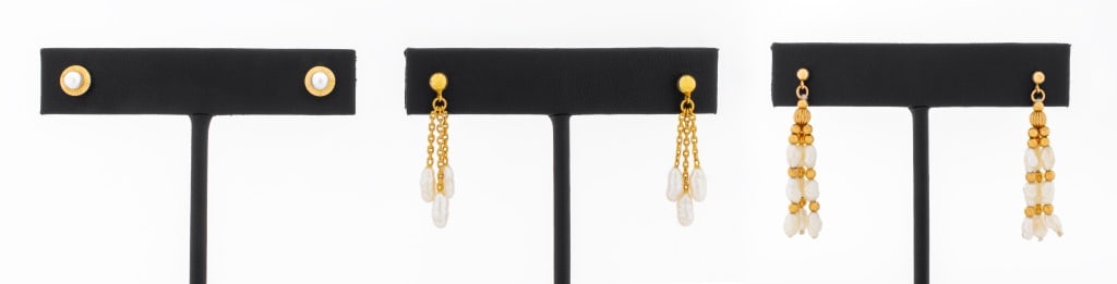 14K Yellow Gold Cultured Pearl Earring Set: Set of Cultured Pearl Earrings, consisting of one pair of 14K yellow gold stud earring with two pearls, approx. 3.5 mm - 4.0 mm, worn through pierced earlobes with threaded posts and backs, marked: "1