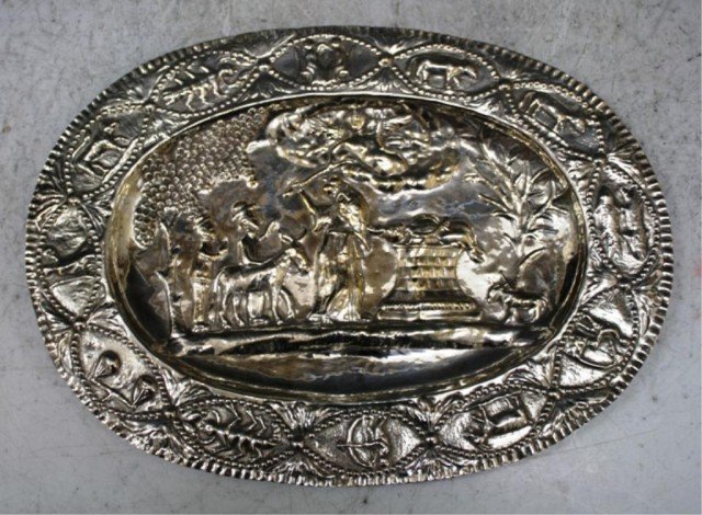 Continental Silver Judaica Sacrifice of Isaac Tray: Continental silver embossed tray depicting the biblical sacrifice of Isaac, Europe, hallmarked. Hallmark: makers mark but difficult to make out Approximate weight: 9.9 regular oz. Dimensions: 13" L x 