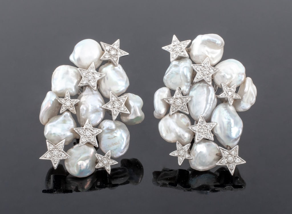18K White Gold Cultured Pearl Diamond Earrings: Pair of Earrings, crafted in 18K white gold, featuring 18 baroque cultured pearls, further adorned with 84 bead set round brilliant diamonds, set in groups of 6 in 18K white gold star shaped symbols, 