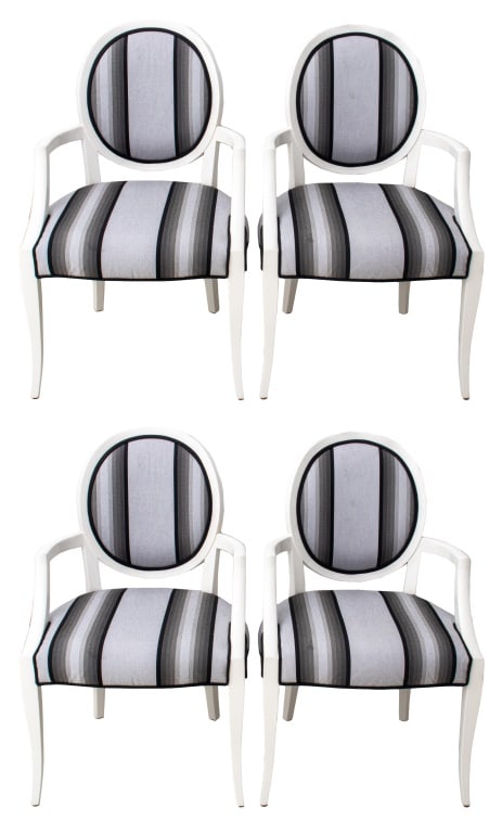 Neoclassical White Painted Armchairs, 4: Set of Four Neoclassical Style White-Painted Armchairs, in the manner of Philippe Starck (French, b. 1949) with oval backs, open arms, and on four tapering square legs, upholstered in gray striped fab