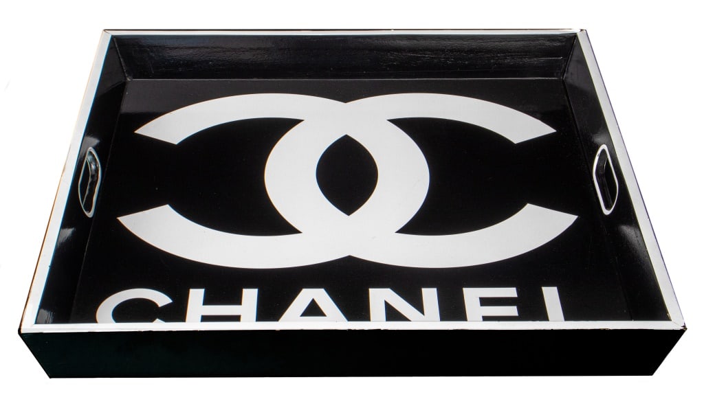 Chanel Style Glam Fashion Black Lacquered Tray: Chanel Style Glam Fashion Black Lacquered Tray with white "double C" logo to center. 3" H x 23.5" W x 23.5" D. Keywords: Table accessories, Designer, Glamour