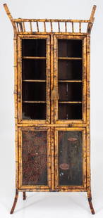 Aesthetic Movement Bamboo and Faux-Lacquer Cabinet: Aesthetic Movement Bamboo and Faux-Lacquer Cabinet Bookcase, with bamboo galleried top above double half-glazed doors opening to reveal shelves, the lower halves of the doors with black and gold faux-