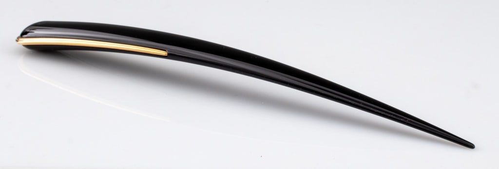 Montblanc Meisterstuck Black Resin Letter Opener: Montblanc Meisterstuck Black Resin Letter Opener, with gold-tone trim, model No. 27300, with original box. 9.50" L x 1" W. Provenance: From a New York City collection. Keywords: Desk Accessories, Desi