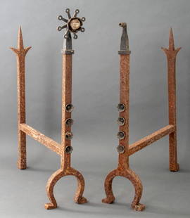 Wrought Iron Andirons, Pair: Pair of Wrought Iron Andirons with scrolling foliate motifs, one with a glass bead finial. Provenance: From a Manhattan collector. Keywords: Fireplace accessories, Chenets, Fire dogs, Horseshoe forms