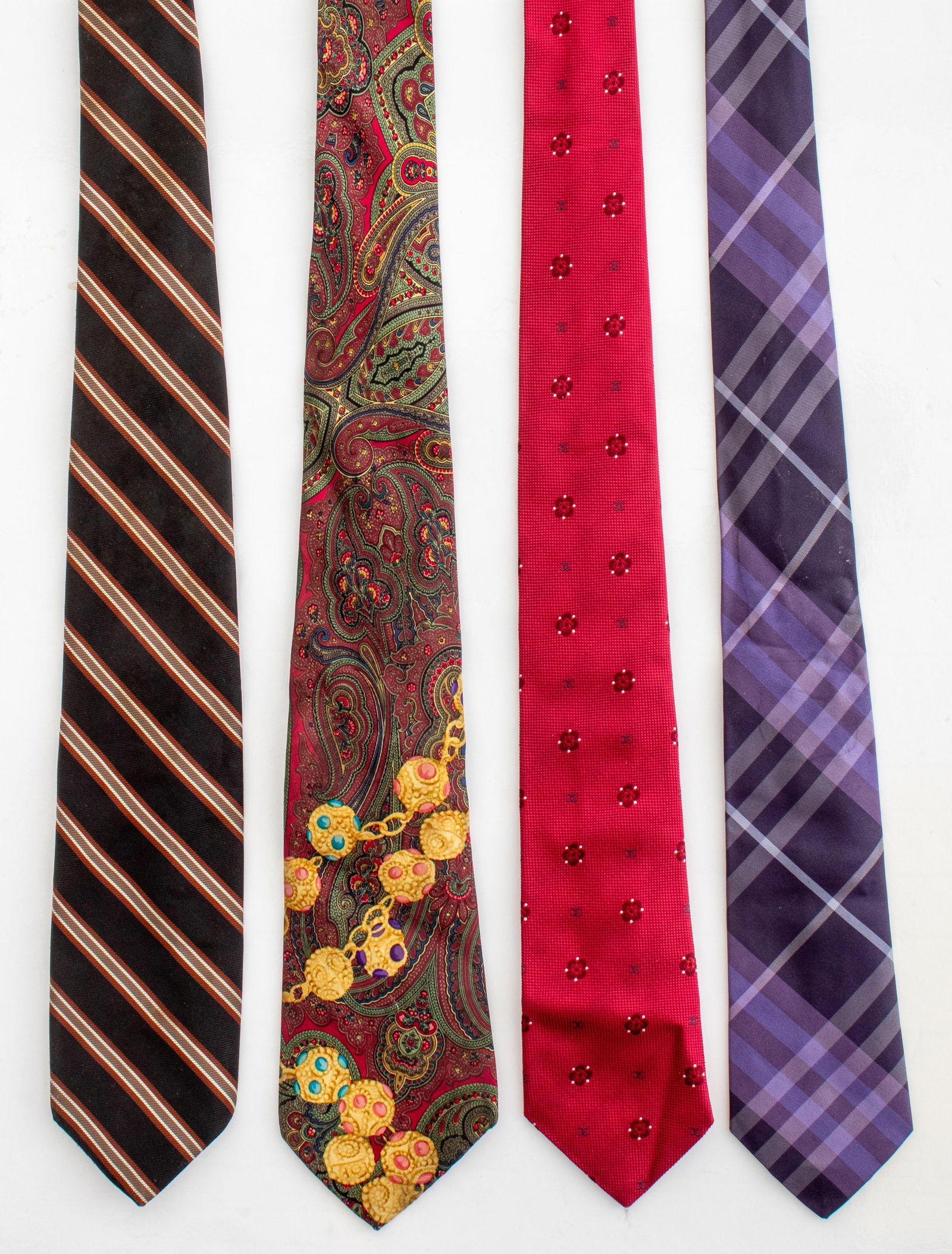 Chanel, Givenchy & Burberry Silk Ties, 4: Two Chanel, one Givenchy and one Burberry Silk Ties in various patterns, 100% silk, made in Italy. 58" L x 4" W. Provenance: From a New York City collection. Keywords: French & British Luxury, Men's F