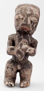 African Carved Wood Ceremonial Figure: African Carved Wood Ceremonial Figure. 12" H x 4.50" W x 4" D. Provenance: From a New York City collection. Keywords: African Art, Ceremony, Male figure, Sculpture, Fetish