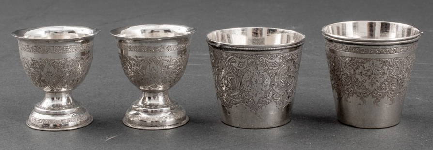 Egyptian Silver Engraved Articles, 4: Group of Four Egyptian Silver Engraved Articles, comprising: two beakers, of typical cylindrical form, allover engraved with Islamic motifs, struck to underside possibly with Ottoman Tughra mark, for