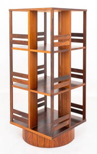 Arts & Crafts Style Rosewood Revolving Bookcase: Arts and Crafts Style Rosewood Revolving Bookcase. 45.5" H x 19.75" W x 19.75" D. Keywords: Mission style, Stickley, Audi, Frank Lloyd Wright, Rotating, Etagere, Shelving