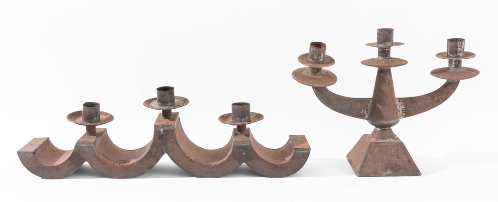American Folk Art Sheet Metal Candelabra, 2: Two American Folk Art Sheet Metal Candelabra, one with semi-circular base supporting three lights, the second with a wave pattern base supporting three lights. Larger: 5" H x 16.5" W x 3" D. Provenanc