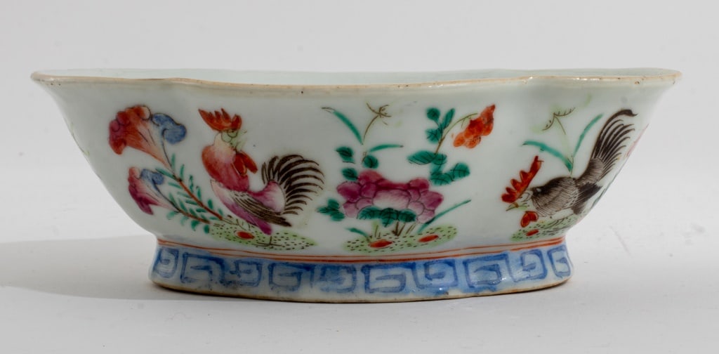 Chinese Famille Rose Porcelain Dish: Chinese Famille Rose Porcelain Dish, of lobed ovoid form with hand-painted flowers and roosters and raised upon a base with blue Greek key design, bearing an overglaze four-character iron red Tongzhi 