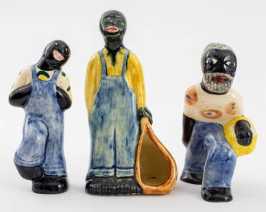 Shearwater Pottery Glazed Ceramic Figurines, 3: Group of Three Shearwater Pottery Figurines, depicting African-American men, one holding a basket, one holding a sack, and one with his hands in his overalls, each with hand-painted polychrome glazes