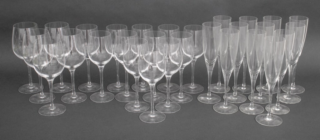 Tiffany & Co. Crystal Stemware, 29: Group of 29 Tiffany and Company Crystal Stemware in the "Classic Home Essentials" pattern, comprising: 12 champagne flutes, 12 white wine glasses, and 5 red wine glasses, all stamped "Tiffany and Co" 