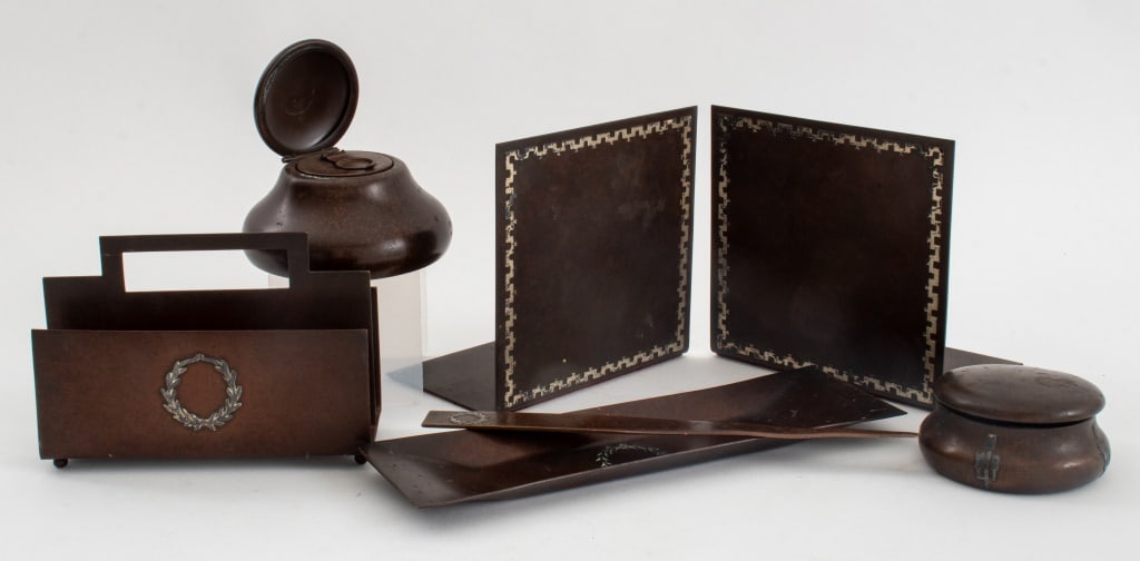Heintz Ams Sterling and Bronze Desk Set, 7: Heintz Art Metal Shop American Sterling Silver Inlaid Patinated Bronze Desk Set, comprising: one letter holder, one letter opener, pair of bookends, one pen tray, one rounded box, one inkwell with gla