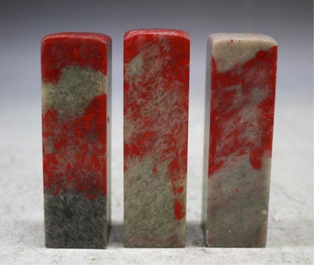 Chinese Lot of 3 Chicken Blood Soapstone Seals: Three piece lot of chicken blood soapstone carved blank seals, China; unmarked. Dimensions: 3-1/2" H x 1" W