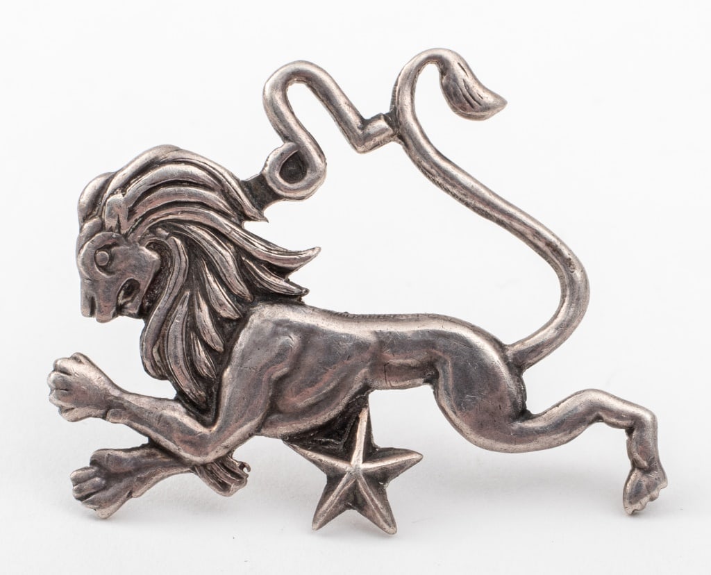 Margot De Taxco Silver Leo Zodiac Motif Brooch: Margot De Taxco Sterling Silver Leo Zodiac Motif Brooch, marked: "MARGOT DE TAXCO / 5227 / STERLING / MADE IN MEXICO" with Mexican hallmark. Pin: 1.62"L x 1.43"W x 0.25"H. Approx: 0.19 ozt. Provenance
