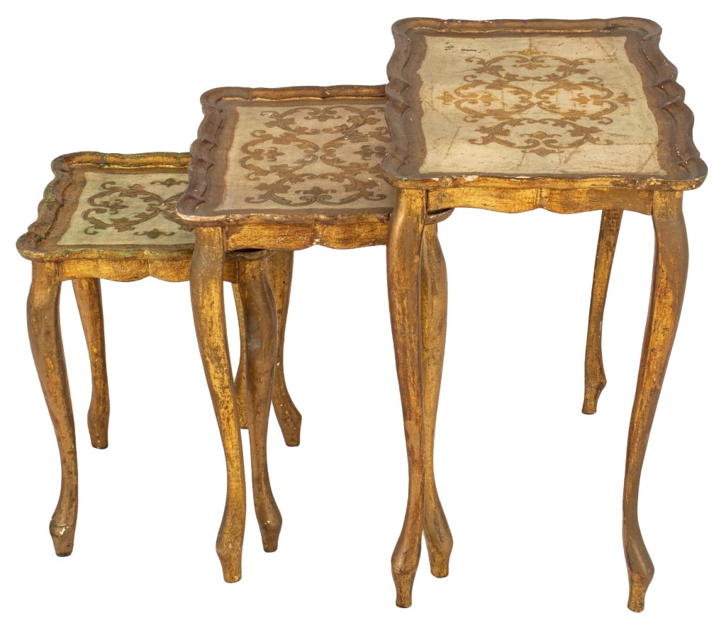 Venetian Rococo Style Nesting Tables, 3: Set of Three Venetian Rococo Style Gold and White Painted Nesting Tables, shaped rectangular tops with gold decoration and borders above gilded cabriole legs on modified volute feet, Made in Italy lab