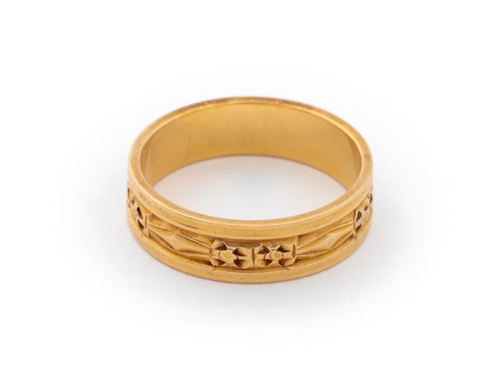 14K Yellow Gold Victorian Style Band Ring: 14K Yellow Gold Victorian Style Band Ring, featuring engraved styling, marked: "14K". Measuring approx. US size 8 1/4, 6 mm width, 3.4 dwt. Provenance: From a Riverside Drive Collection. Keywords: Jew