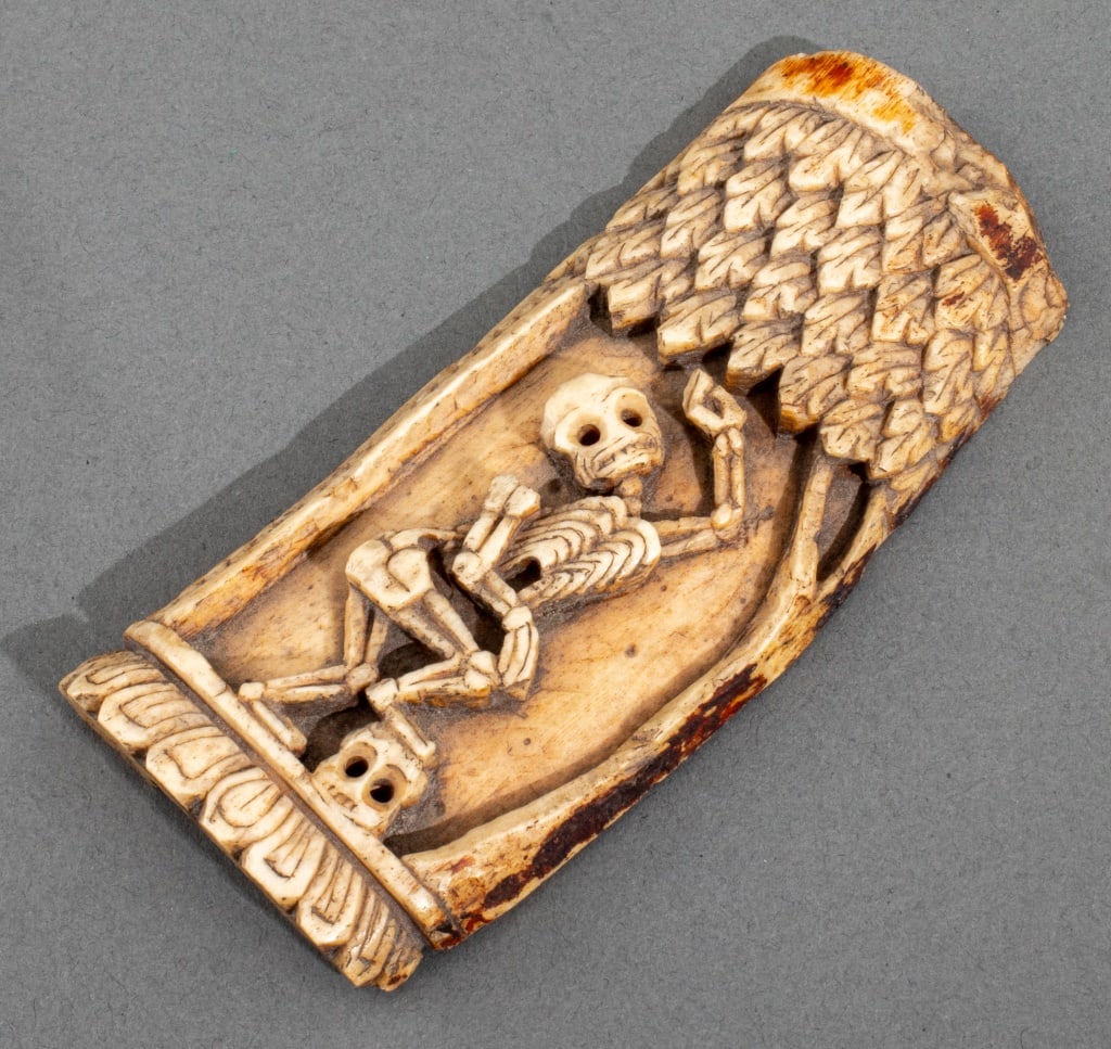 Tibetan Carved Bone Citipati, 18th C.: Tibetan Carved Bone Citipati, eighteenth century, hand-carved with a skeleton figure dancing atop a human skull. 4.5" H x 2" W x 0.5" D. Provenance: From an Upper West Side Collection. Keywords: Nepal