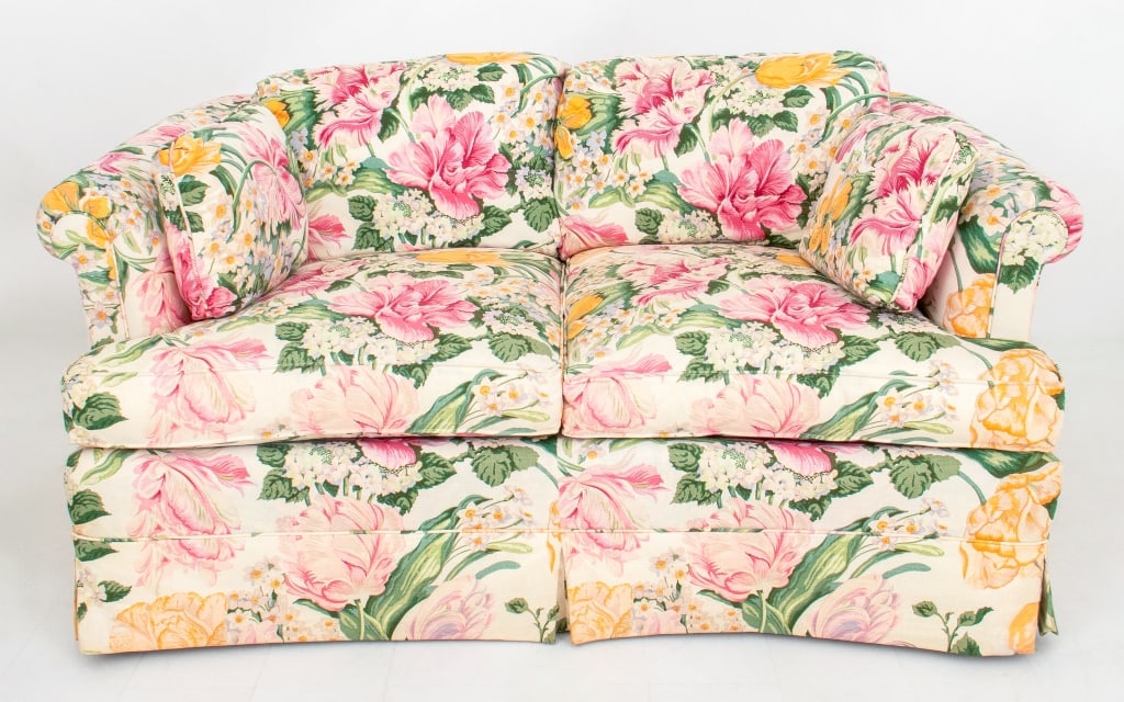 Floral Chintz Slip-Covered Upholstered Sofa: Floral Chintz Slip-Covered Upholstered Sofa. 28" H x 57" W x 35" D; seat: 17" H. Provenance: From a New York City Collection. Keywords: Furniture, Seating, Couch, Flower pattern, Roses. Note: This ite