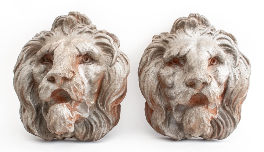 Patinated Resin Lion Masques, Pair: Patinated Resin Lion Masques, marked "CN", 20th century. 10" H x 9" W x 5.5" D. Provenance: From a 50 Madison Avenue Estate. Keywords: Classical, Neoclassical, Beaux Arts, Animalier, Feline, Big cats