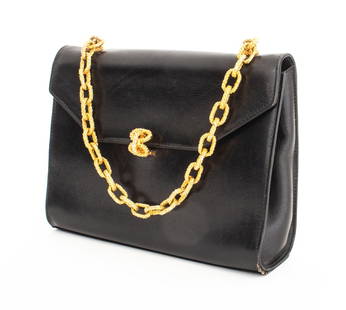 Gucci Black Leather Evening Bag: Gucci Black Leather Evening Bag, marked "Made in Italy / by / Gucci" inside, with front flap and gold-tone metal chain link handle. To handle: 12.25" H x 8.25" W x 2.25" D. Provenance: From a 575