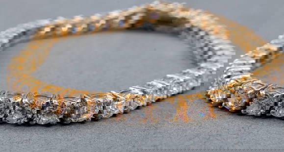 Vermeil Silver Cubic Zirconia Tennis Bracelet: Vermeil Sterling Silver "CZ" Cubic Zirconia Lady's Tennis Bracelet, prong set with approx: 4 mm cubic zirconia stones; box clasp flanked with two figure eight safety clasps. Marked: "925". Bracelet