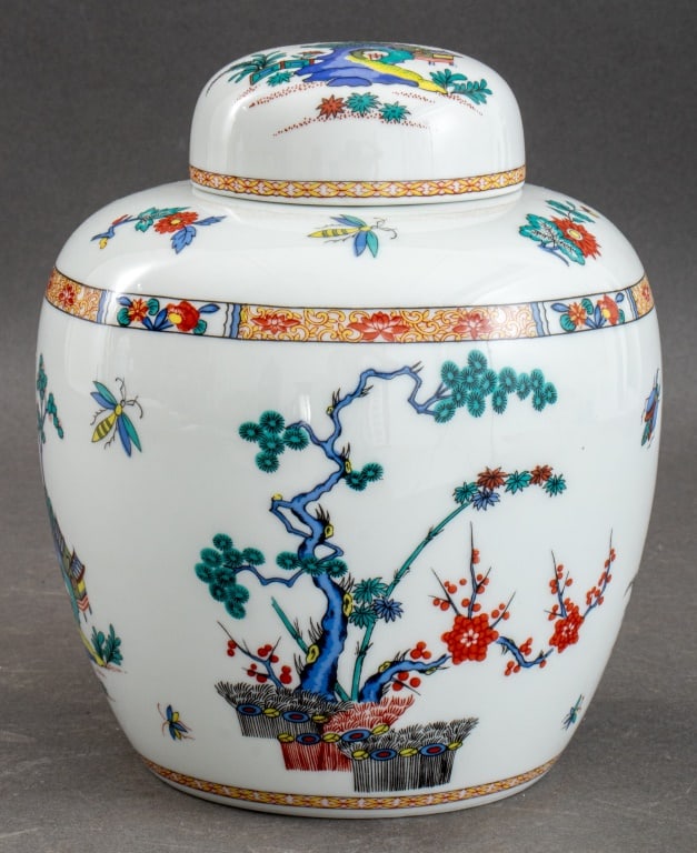 Bernardaud Porcelain "Pak Hoi" Covered Jar: Bernardaud Porcelain Covered Jar, with marks for Bernardaud, Limoges, and France to undersides, the vase titled "Pak Hoi" and decorated allover with chinoiserie scenes on a white ground. 8" H x 6.5" D