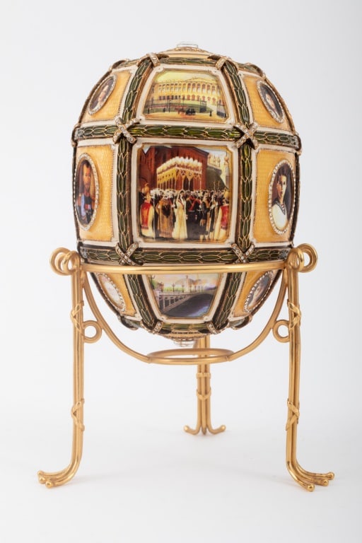 Faberge Imperial 15th Anniversary Nicholas II Egg: House of Faberge After Imperial 15th Anniversary of Nicholas II Accession Enameled Egg, champagne and opaque white enamel with a grid of green enamel garlands, with rhinestones cross-ties framing sixt