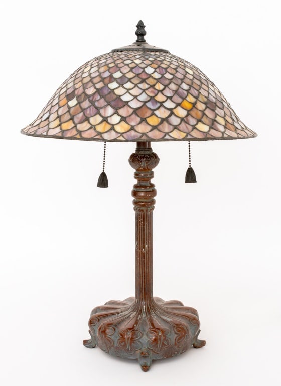 Art Nouveau Style Slag Glass Table Lamp: Art Nouveau Style Quoizel Slag Glass Table Lamp, on patinated metal base, with metal "Quoizel Collection" label to underside of shade, and paper "Underwriter's Laboratories" label to base. 22.5" H x 1