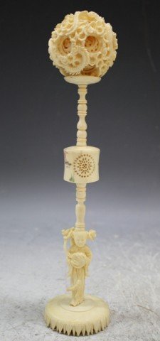 Chinese Carved Ivory Puzzle Ball w/ Stand 19th C.: Carved ivory puzzle lucky 8 ball with ivory stand with beauty at base; ball is made up of eight carved balls in descending size within each other, with the number 8 signifying good luck, China, late n