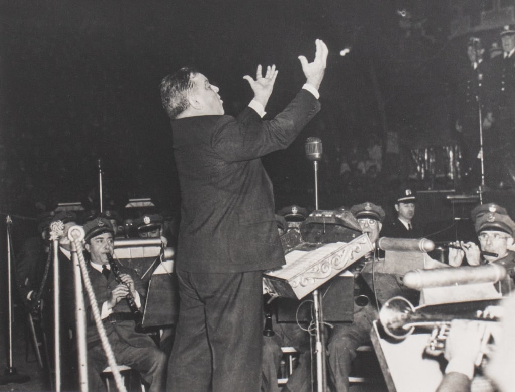Nat Fein "F.H. LaGuardia..." Gelatin Silver Print: Nat Fein (American, 1914-2000), "L.H. LaGuardia Conducting the Band of the Department of Sanitation, City of New York", Gelatin Silver Print, signed to verso, photographed for the New York Herald Trib