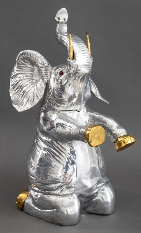 Arthur Court Silvered & Gilt Elephant Ice Bucket: Arthur Court Silvered and Gilded Elephant Form Ice Bucket, the hinged head in the form of the elephant's head with ears wide, above a kneeling body with trunk raised. 21" H x 10" Diameter. Provenance: