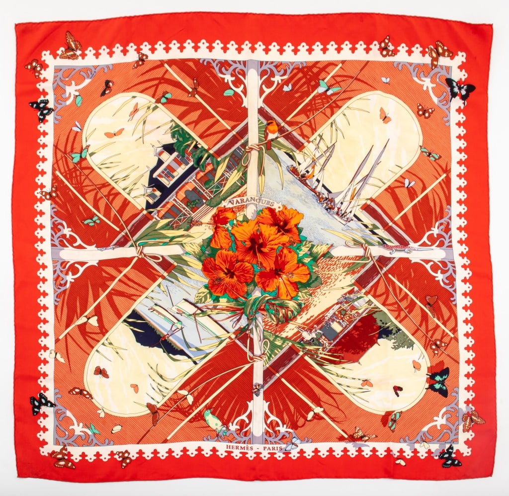 Hermes "Varangues" Red Silk Twill Scarf: Hermes "Varangues" Pattern Square Silk Twill Scarf, designed by Dimitri Rybaltchenko circa 2001, depicting hibiscus flowers in the center with sailboats on seascapes and colonial homes on a red ground