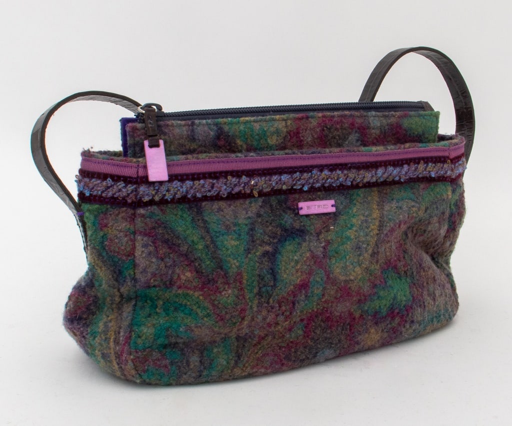 Etro Paisley Wool Handbag: Etro Paisley Wool Handbag, purple and green paisley print exterior with purple silk interior, marked "Etro / Made in Italy" inside, brown leather strap with crocodile pattern. 7.5" H x 11" W x 4" D. P