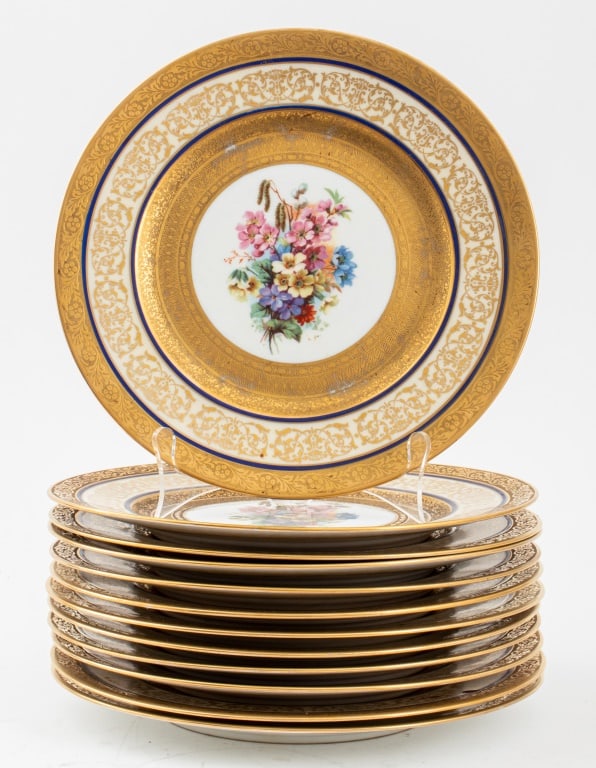 Royal Bavarian Gilt and Painted Dinner Plates, 12: Set of 12 Royal Bavarian Gilt and Painted Porcelain Dinner Plates, each with cisele gilt edge and cobalt bordered Florentine gilt rim, the cavetto decorated with cisele gilding and centering bouquets