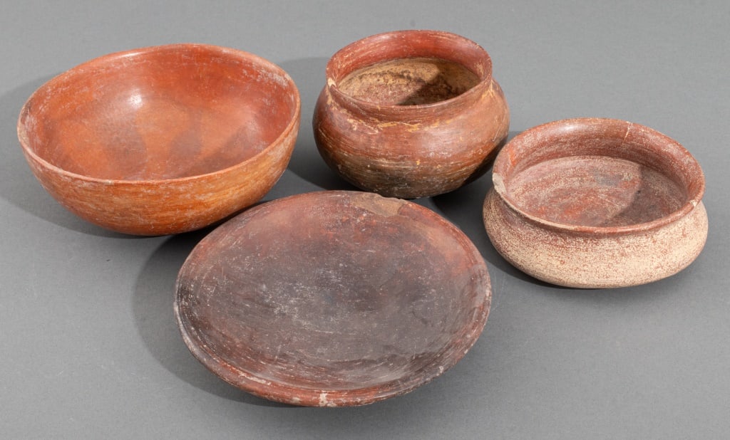 Pre-Columbian Pottery Articles, 4: Group of Four Pre-Columbian Pottery Articles, comprising: one redware bowl with interior swirling geometric decoration, two bowls, and one plate. Largest: 2.25" H x 6.25" Diameter. Provenance: From a