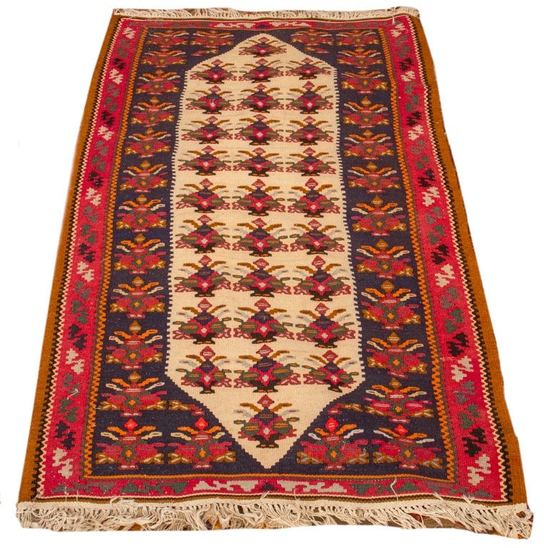 Kilim Rug, 5' 5" x 3' 3.5": Kilim Rug, in magenta with fringe. 5' 5" L x 3' 3.5" W. Provenance: From a Christopher Street Collection. Keywords: Textile, Area carpet, Decor, Repeating Pattern, Decorative Arts, Floor covering