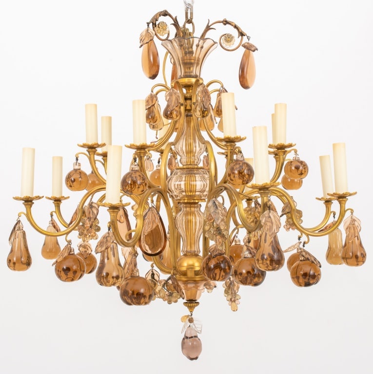 Louis XV Style Amber Glass 16-Light Chandelier: Louis XV Style Gilt Metal Cage-Form Amber Glass 16-Light Chandelier, with tripartite amber glass baluster surrounded by two tiers of eight lights, the candle arms hung with amber glass pears, grapes, 