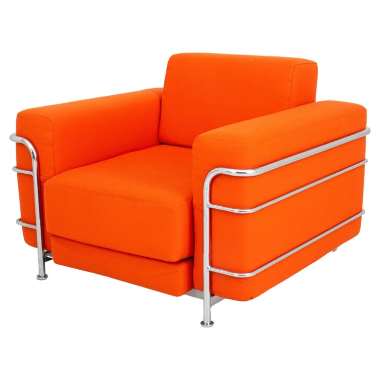Le Corbusier LC2 Style Orange Sleeper Chair: Le Corbusier Model LC2 Style Bright Orange Covered Convertible Armchair Chaise Longue, chromed metal frame, "Made in Denmark" label to reverse. 28" H x 38" W x 32.5" D; seat: 14.5" H. Provenance: From