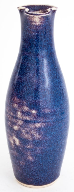 Thomas Bezanson Bottle Form Porcelain Vase: Brother Thomas Bezanson (Canadian, 1929-2007), Bottle Form Porcelain Vase in speckled blue glaze with shaped rim, signed and inscribed "Benedictine Monks / Weston VT" to underside. 8.25" H x 3" Diamet