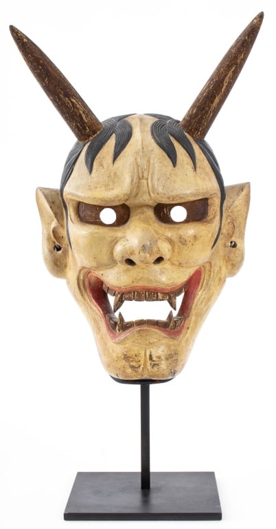 Japanese Hannya Noh Mask: Japanese Hannya Noh Mask, with hand-painted details, Japanese characters inscribed to reverse, mounted on metal stand. 15.5" H x 8" W x 5" D. Provenance: From a Manhattan Collection. Keywords: Sculptu