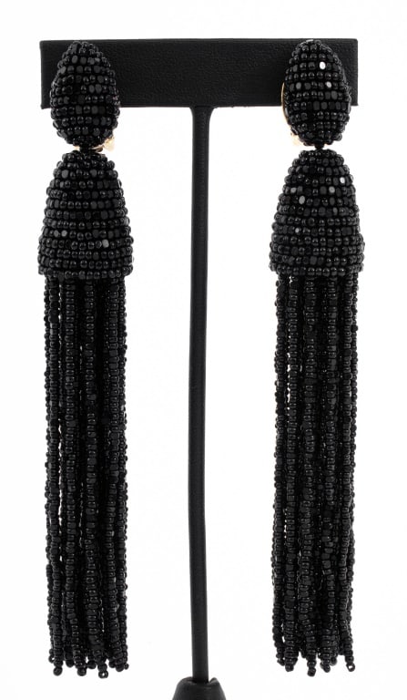 Oscar De La Renta Beaded Clip-On Earrings: Pair of Oscar De La Renta Beaded Clip-On Earrings, black beads and gold-tone metal, marked "Oscar de la Renta" to back of clip. 5" H x 0.75" Diameter. Provenance: From a New York City Collection. Keyw