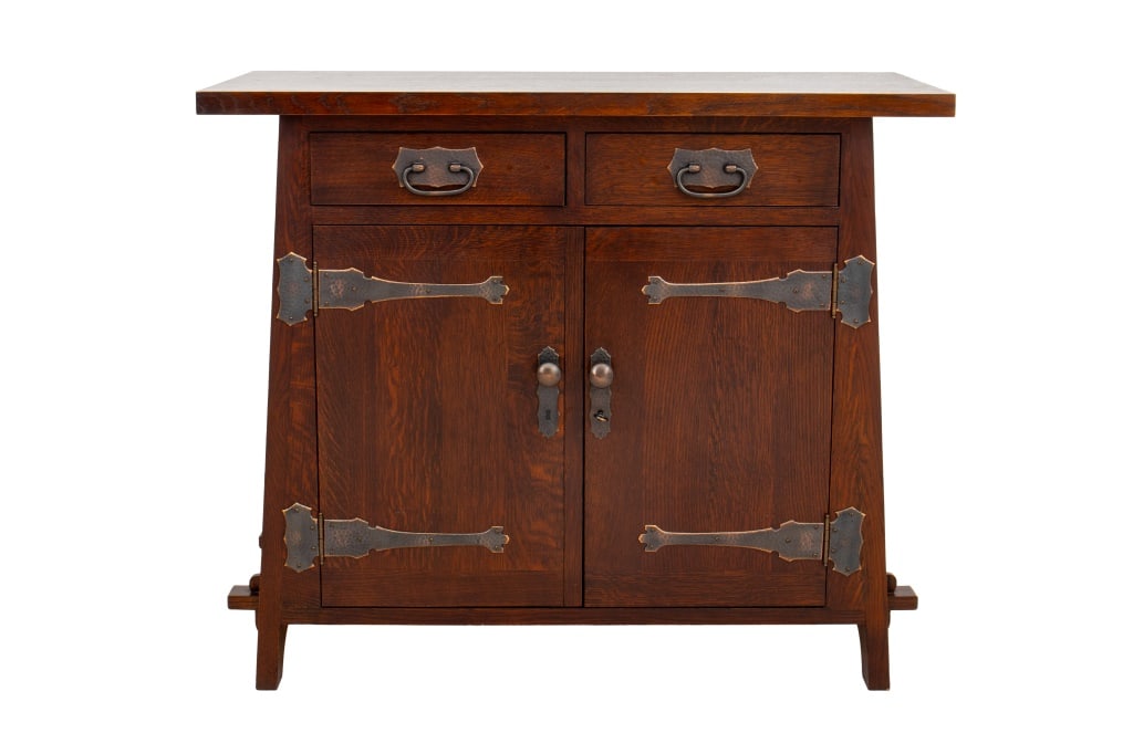Stickley Roycroft Oak Cellaret Cabinet: Stickley Roycroft Oak Cellaret Cabinet, with canted sides, two cabinet doors, and two drawers, burnished Stickley Mark and label to interior, Roycroft Orb mark carved to sides. 34" H x 40" W x 19.5" D